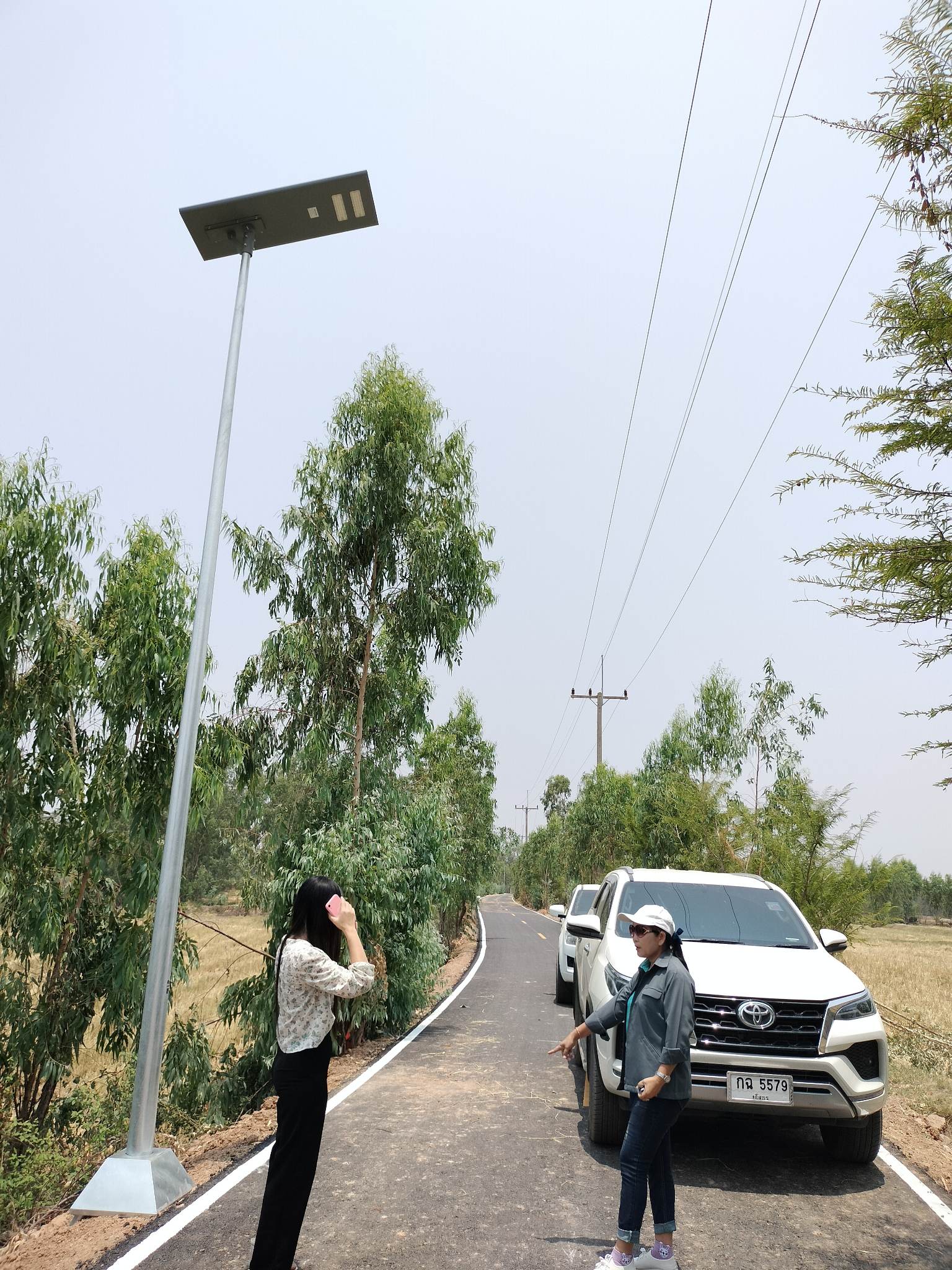  คณะกรรมการตรวจงานโครงการก่อสร้างถนนลาดยาง